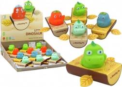 Jucărie cu mecanism de întoarcere pentru baie – dinozaur în bărcuță