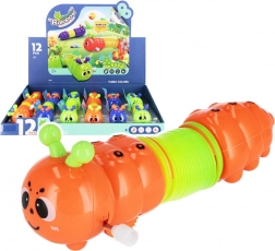 Omidă cu arc – jucărie din plastic care se mișcă, 14 cm