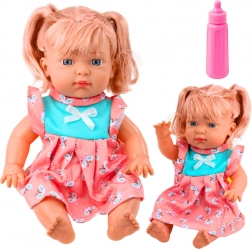 Păpușă bebeluș în rochii colorate cu biberon și sunete