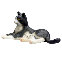 pisică Mojo alb-negru culcată