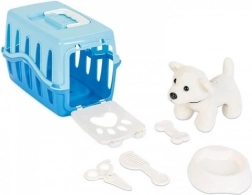 Căţeluş în cutie de transport albastră