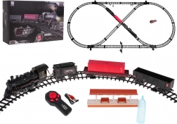 Set feroviar cu locomotivă care scoate fum, cu lumină și muzică