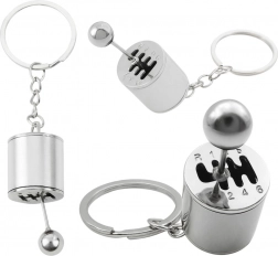 Breloc metalic în formă de cutie de viteze, argintiu