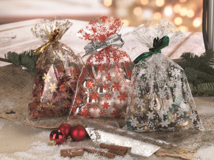 Punguță din celofan 16 × 25 cm transparentă cu motiv fulgi de zăpadă