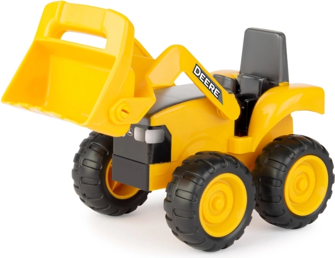 Tractor/încărcător pentru adunarea și mutarea materialului