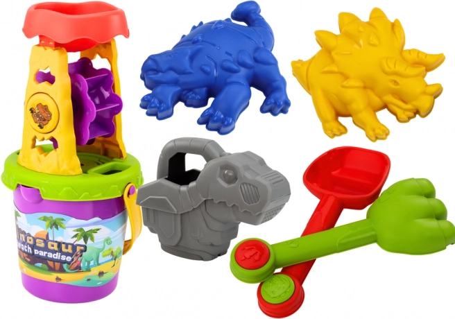 Set de nisip cu dinozauri cu moară – lopățică, greblă, stropitoare și forme