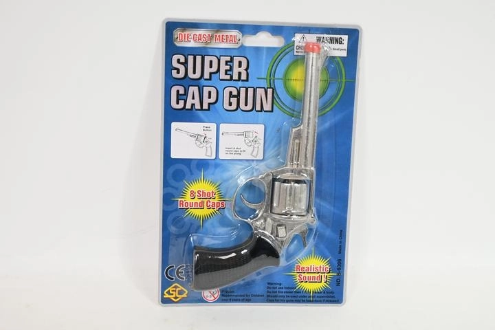 Pistol metalic cu capse în stil revolver