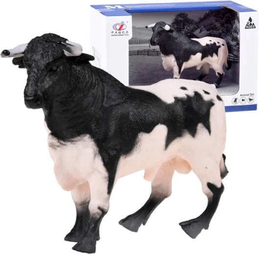 Figurină cu taur alb-negru de la fermă