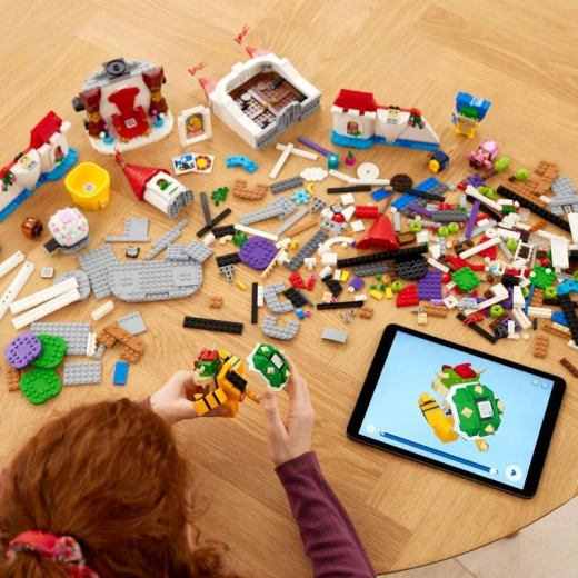 Instrucțiuni digitale în aplicația LEGO Super Mario