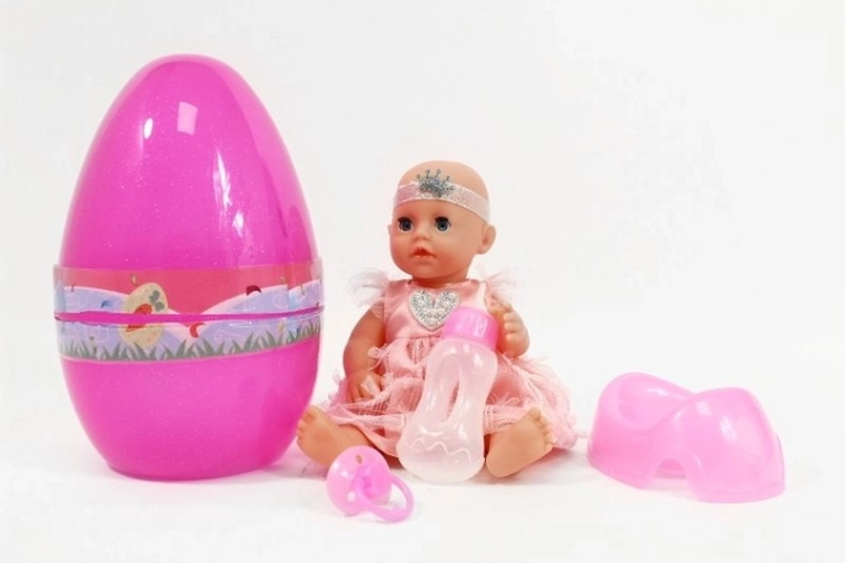 Păpușă de 25 cm cu set cu oliță, în ambalaj în formă de ou