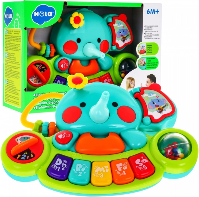 Elefant interactiv cu mini pian pentru copii 6m+ – jucărie muzicală și zornăitoare