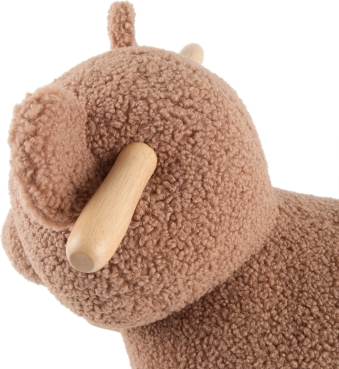 Suprafață moale din buclé, care invită la alint