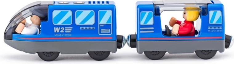 Tren personal cu mecanic de locomotivă și pasageri pe baterii