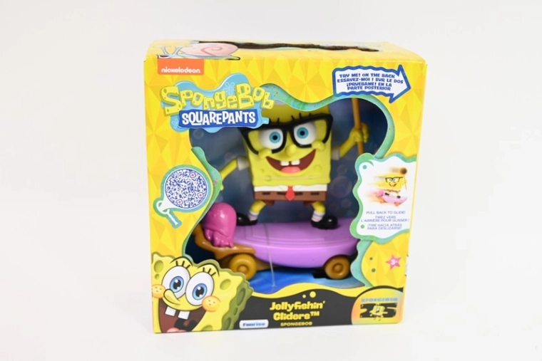 Figurină SpongeBob SquarePants pe skateboard cu meduză