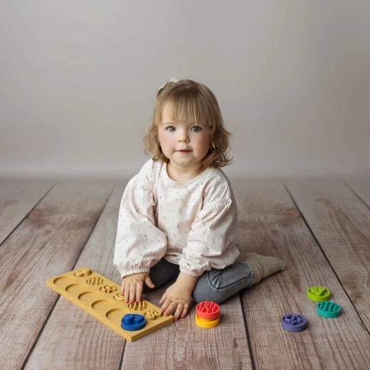 Prindere ușoară și dezvoltarea motricității fine