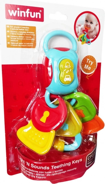 Zornăitoare și suzetă de dentiție în formă de chei, cu lumini și sunete