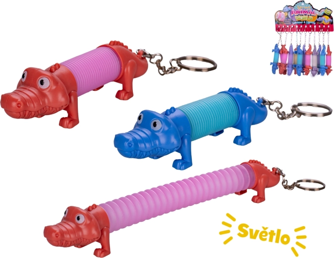 Breloc cu crocodil cu arc și lumină