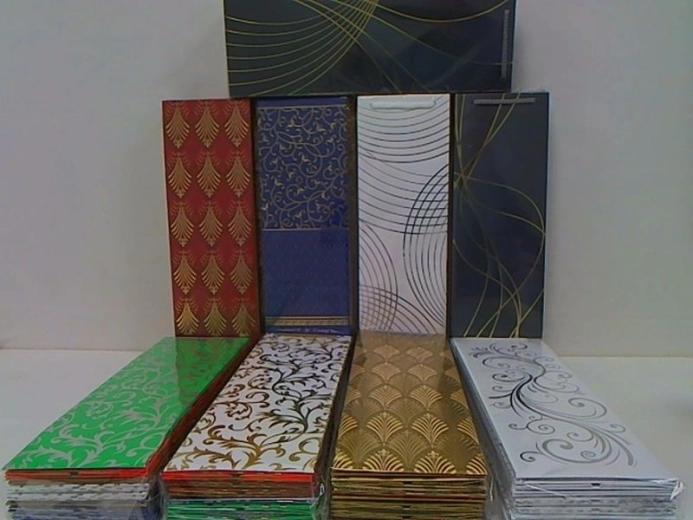 Pungă cadou decorativă pentru sticlă Avantgarde cu decorațiuni aurii