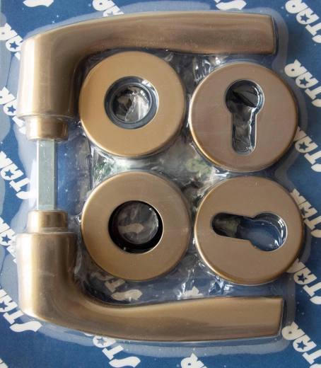 Feronerie pentru uși MONET pe rozetă, pentru cilindru, bronz eloxat