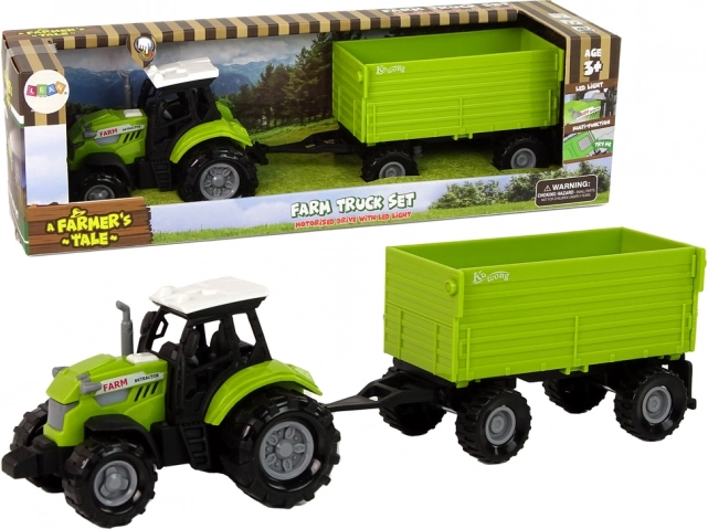 Tractor agricol verde cu remorcă