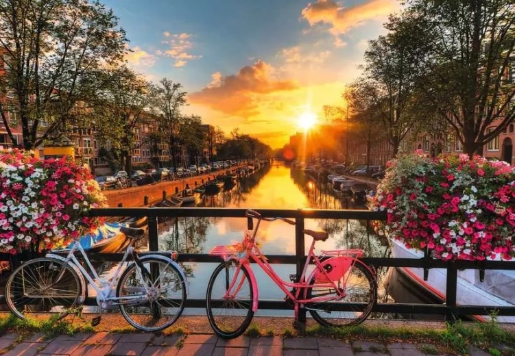Puzzle Ravensburger „Apus de soare în Amsterdam” XL, 200 de piese
