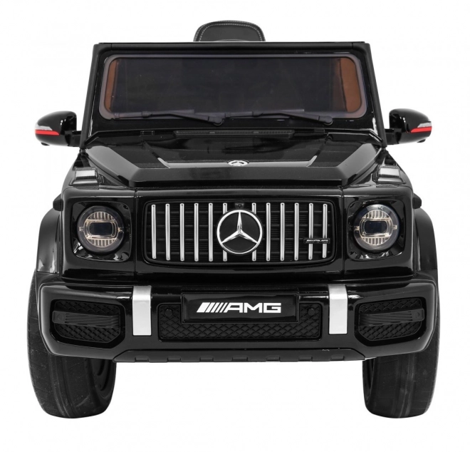 Mercedes AMG G63 pentru copii Lak negru + telecomandă + MP3 LED + pornire lentă + EVA + centuri