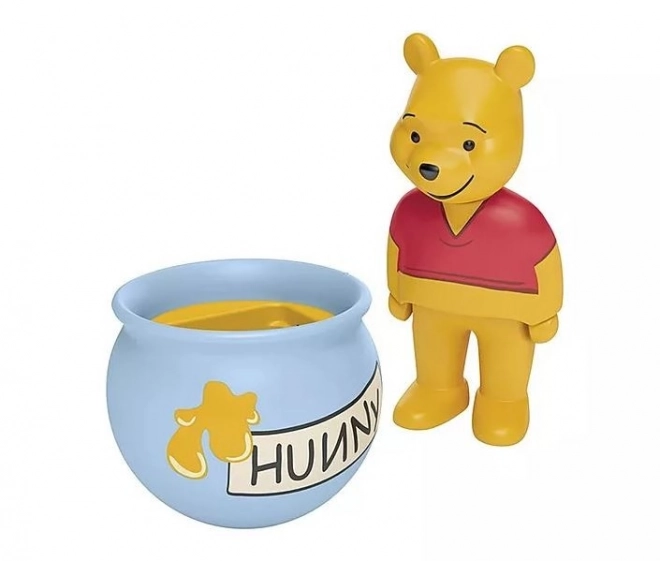 Figurină Junior Disney Oala cu miere a lui Winnie de Pluş