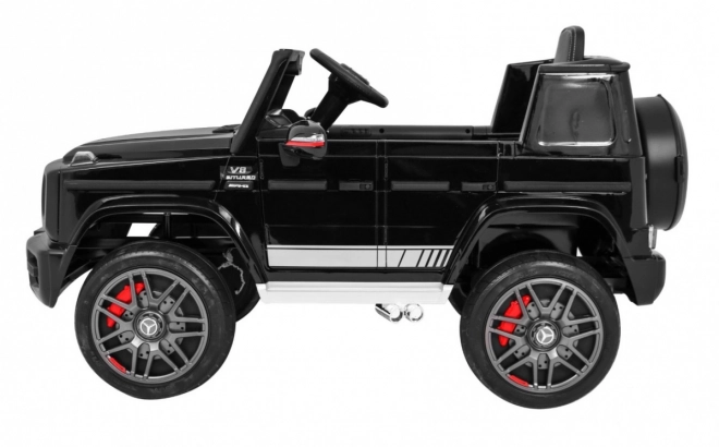Mercedes AMG G63 pentru copii Lak negru + telecomandă + MP3 LED + pornire lentă + EVA + centuri