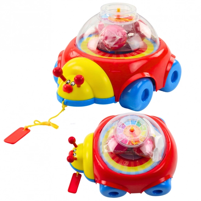 Buburuză de jucărie cu ceas și bile rotative