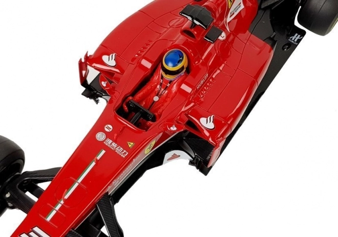 Mașina de curse Ferrari F138 Formula 1 roșie