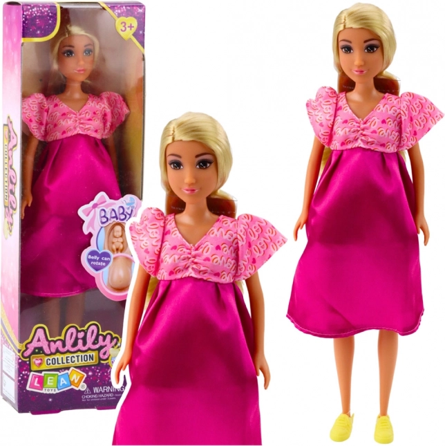 Păpușa Anlily în sarcină în rochie roz cu păr lung