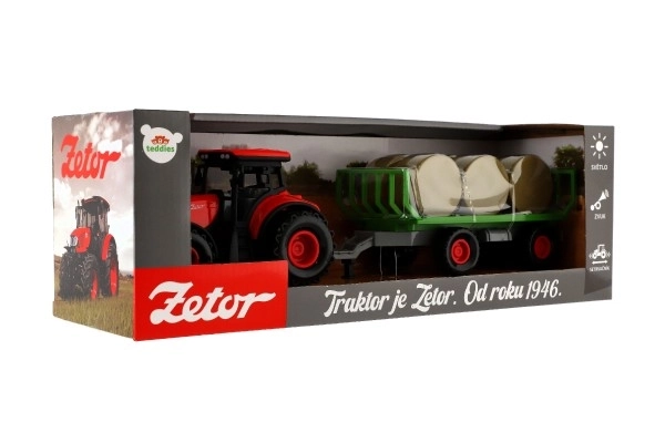 Tractor Zetor cu remorcă și baloți