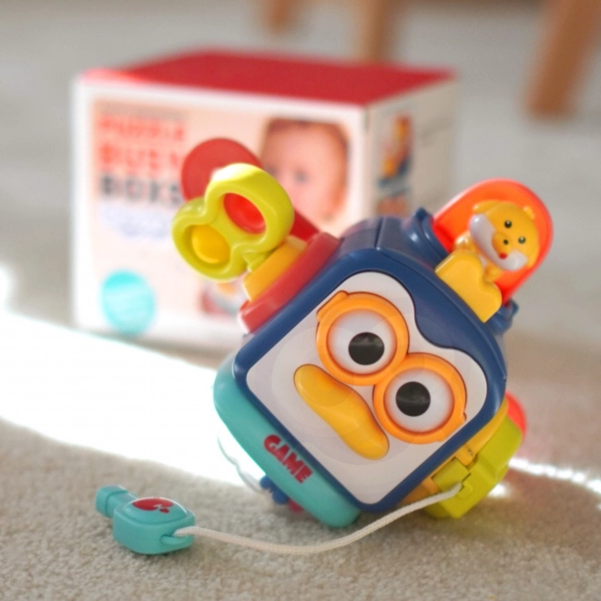 Pingwin WOOPIE educațional Montessori 6-in-1 cu bile senzoriale
