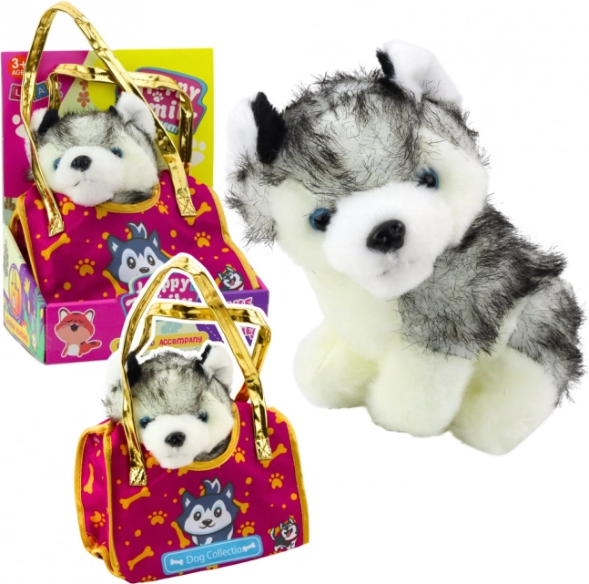 Câine husky din pluș în geantă