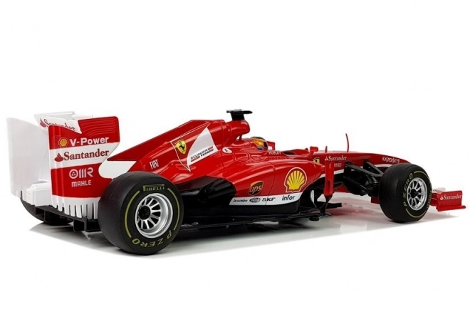Mașina de curse Ferrari F138 Formula 1 roșie