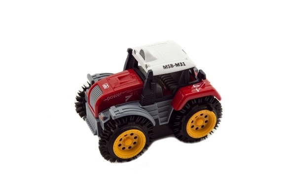 Tractor răsturnibil din plastic 10cm mix de culori pe baterii