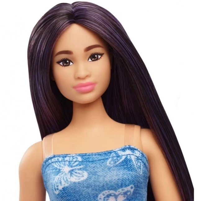 Barbie model în rochie albastră cu fluturi