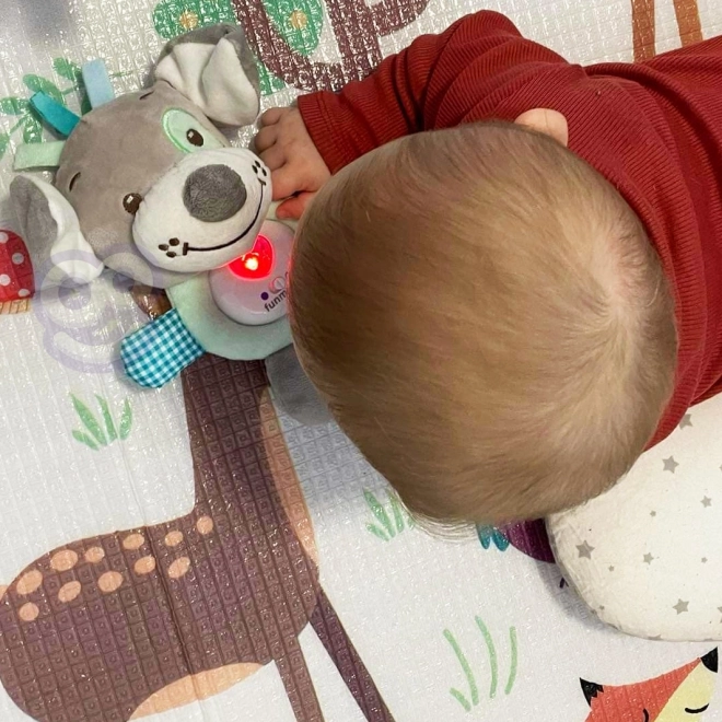 Căţeluş interactiv pluș cu lumină și sunet Woopie Baby