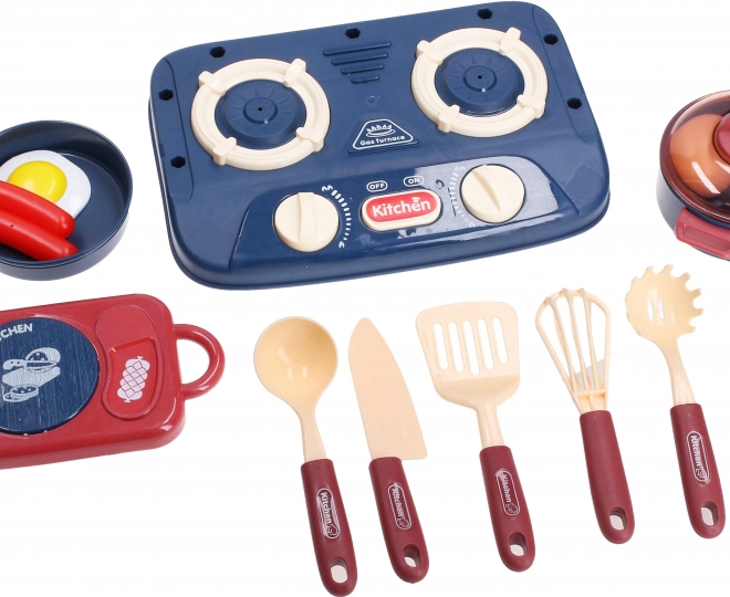 Set de bucătărie cu aragaz, vase și alimente