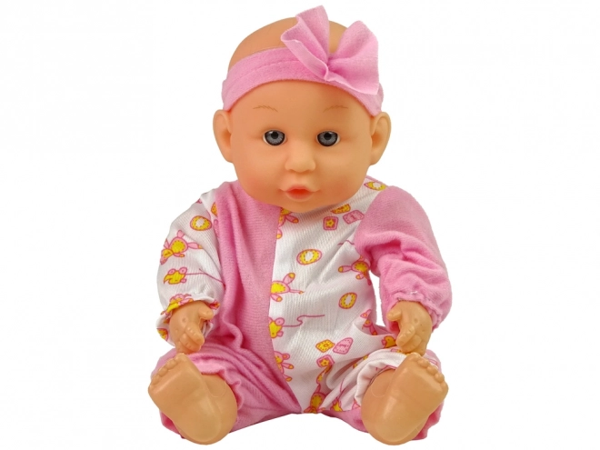 Păpușă bebeluș roz pișoțel și accesorii 24 cm