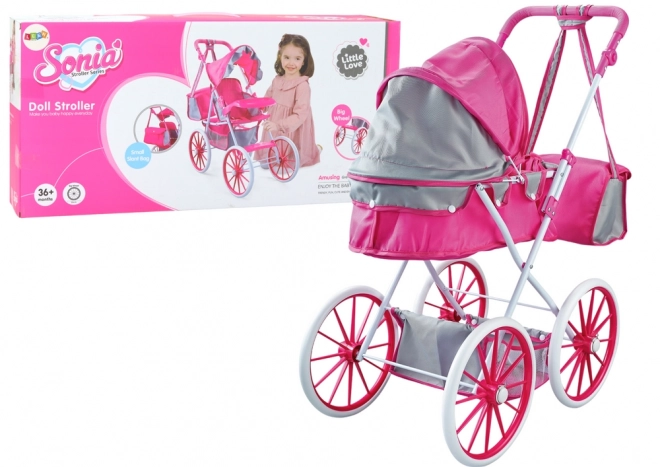 Carucior pentru papusi din metal cu roti mari roz