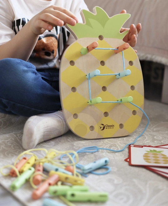 Jucărie educativă din lemn Ananas cu pioneze Classic World