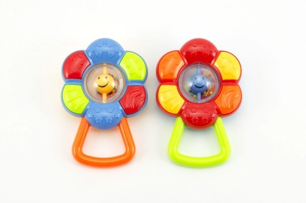 Zornă floricică plastic 12cm 2 culori pe cartonaș 3m+