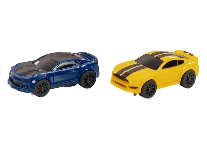 Două mașini sport la scară 1:64