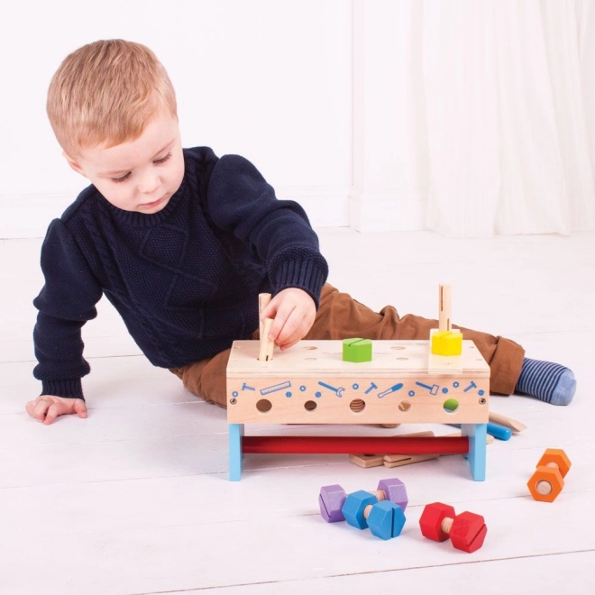 banc de lucru și cutie de unelte 2in1 pentru copii de la Bigjigs Toys