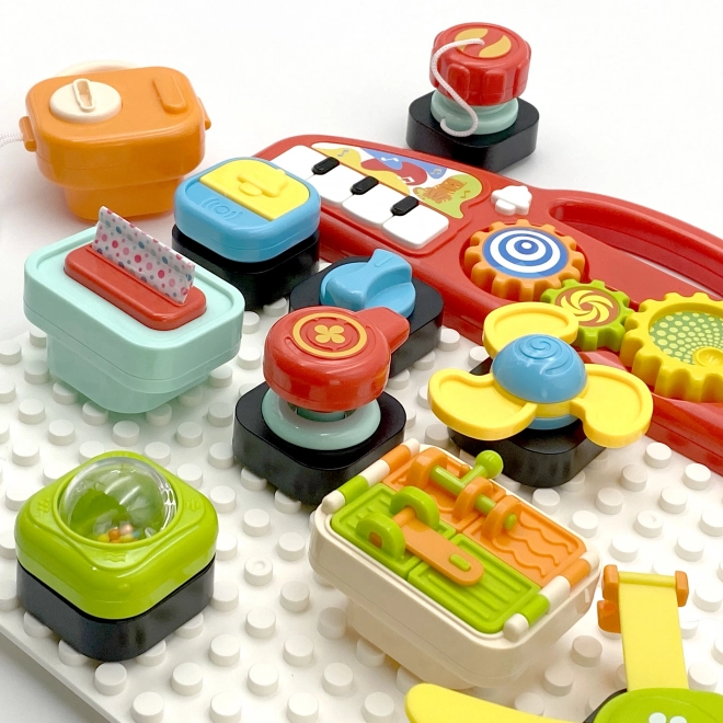 Tablă manipulatorie Montessori Woopie Baby - Panou de activitate colorat