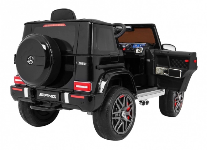 Mercedes AMG G63 pentru copii Lak negru + telecomandă + MP3 LED + pornire lentă + EVA + centuri