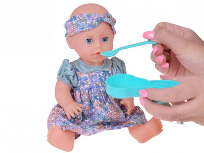 Lăbilă de gumă bebeluș cu accesorii care bea și face pipi