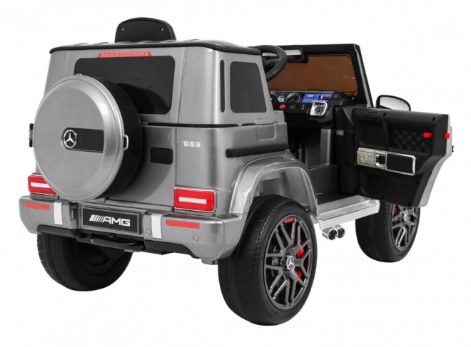 Mercedes AMG G63 pentru copii Vopsea argintie + telecomandă + MP3 LED + start lent + EVA + centuri
