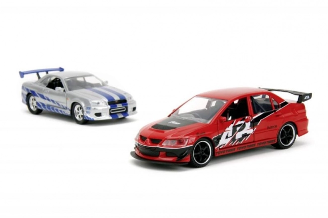 Set mașini Fast & Furious Mitsubishi Lancer Evo IX și Nissan Skyline GTR R34 la scară 1:32